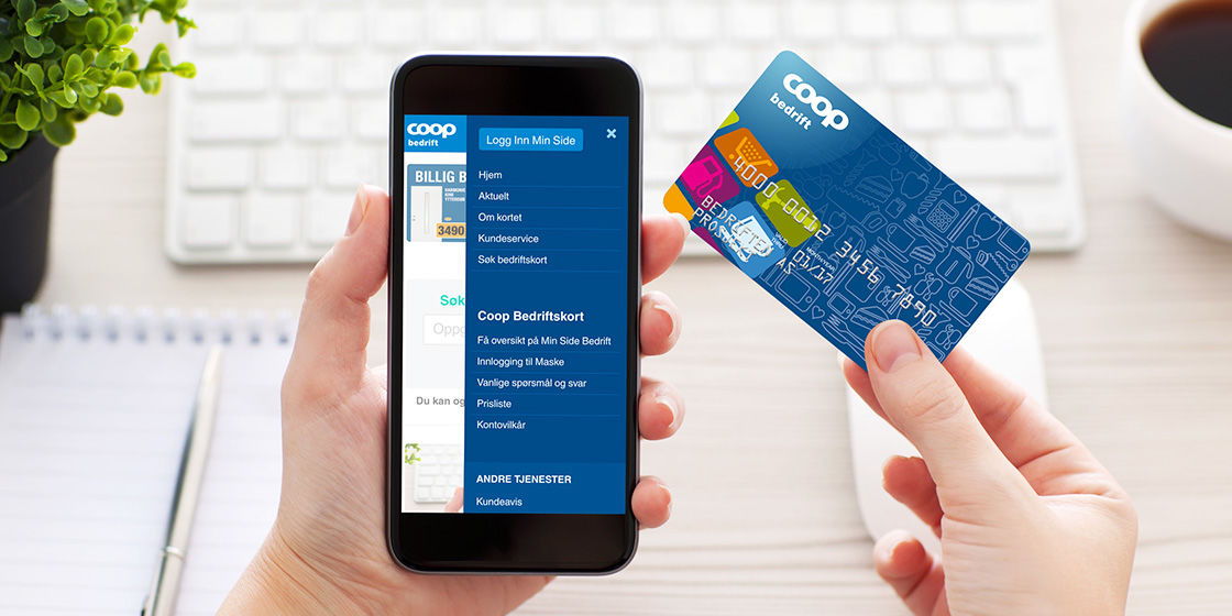 Coop bedrift nettside på mobil ved siden av bedriftskort